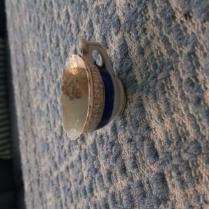 Itty bitty porclain tea cup